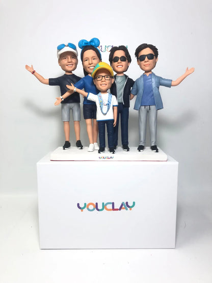 Five family members in Disney ears and sunglasses, arms spread wide, a cheerful bobblehead group