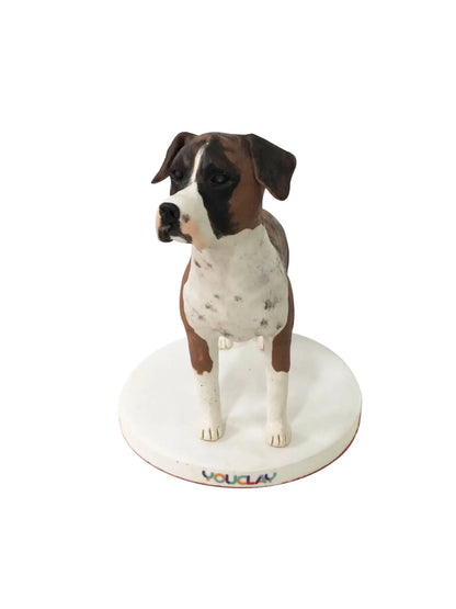 Brown and white boxer dog standing alert, a custom pet figurine hand-sculpted in polymer clay
